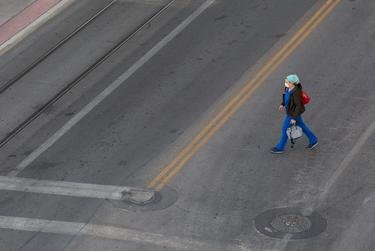 A medical worker walks near Las Palmas Medical Center in El Paso.