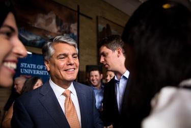 University of Texas at Austin President Greg Fenves talks with attendees after his state of the university address on Sept. 13, 2016.